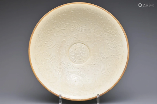 A LARGE CHINESE DING-TYPE PORCELAIN BOWL