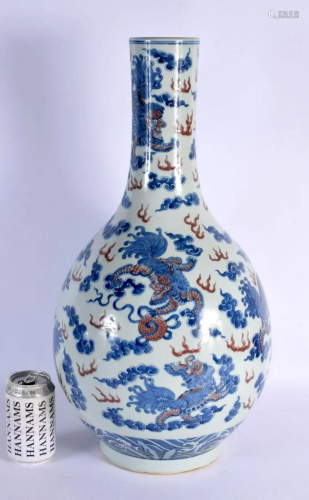A LARGE 19TH CENTURY CHINESE BLUE AND WHITE IRON RED PORCELA...