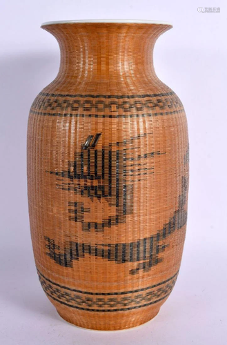 A CHINESE REPUBLICAN PERIOD WICKER OVERLAID PORCELAIN VASE. ...