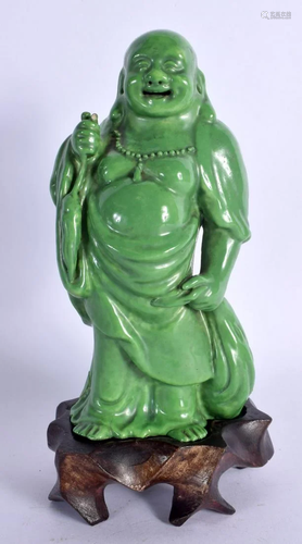 AN EARLY 20TH CENTURY CHINESE GREEN GLAZED PORCELAIN BUDDHA ...