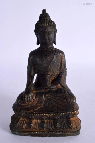 A 17TH/18TH CENTURY CHINESE BRONZE FIGURE OF A SEATED BUDDHA...