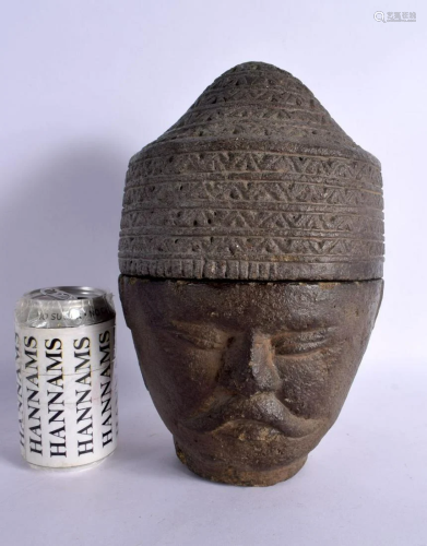 AN EARLY SOUTH EAST ASIAN CAMBODIAN STONE JAR AND COVER form...
