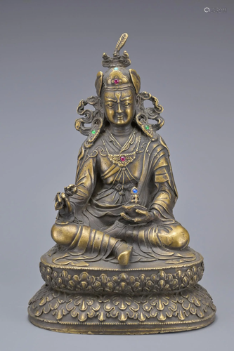 A TIBETAN BRONZE FIGURE