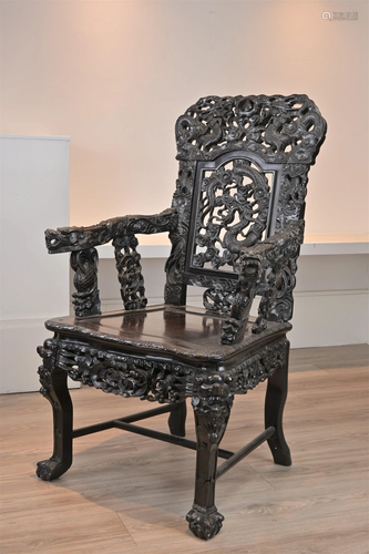 A CHINESE HARDWOOD ARMCHAIR, 19TH CENTURY