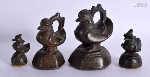 FOUR 19TH CENTURY INDIAN BRONZE OPIUM WEIGHTS. Largest 11 cm...