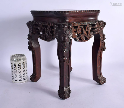 A SMALL 19TH CENTURY CHINESE CARVED HARDWOOD STAND Late Qing...