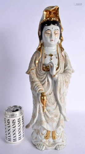 A LARGE JAPANESE TAISHO PERIOD PORCELAIN FIGURE OF A FEMALE....