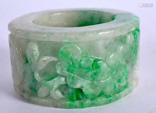 A CHINESE CARVED JADEITE ARCHERS RING Late Qing/Republic. 5....