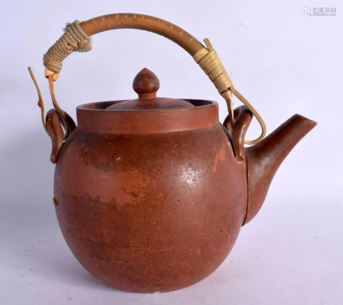 A CHINESE REPUBLICAN PERIOD YIXING TEAPOT AND COVER. 18 cm x...