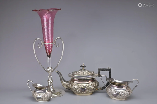 A CRANBERRY GLASS TRUMPET VASE WITH TEAPOT