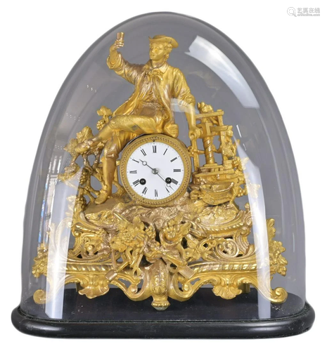 A FRENCH GILT METAL MANTEL CLOCK IN GLASS DOME, 19TH CENTURY