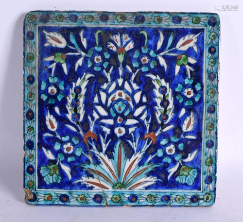 AN ANTIQUE MIDDLE EASTERN TURKISH IZNIK FAIENCE TILE. 21 cm ...