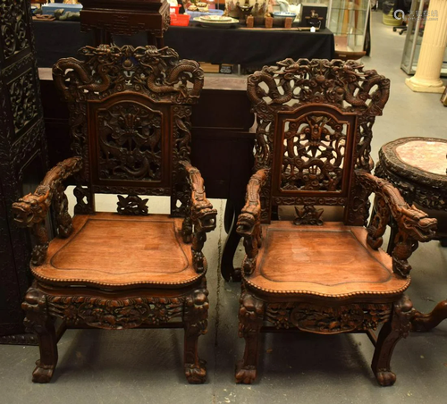 A LARGE PAIR OF 19TH CENTURY CHINESE CARVED HONGMU ARM CHAIR...