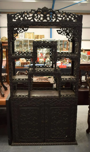 A LARGE 19TH CENTURY CHINESE CARVED HOMGMU DISPLAY CABINET w...
