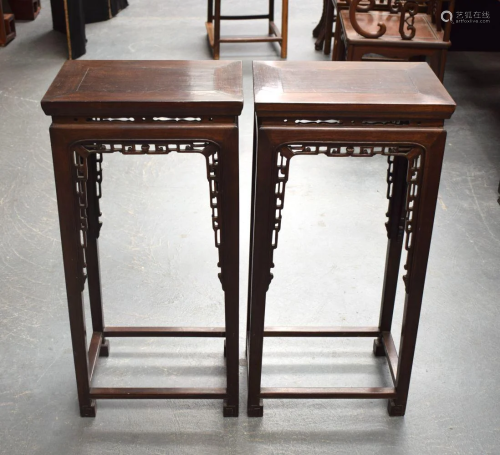 A PAIR OF EARLY 20TH CENTURY CHINESE CARVED HARDWOOD STANDS....