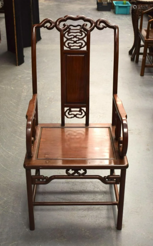 AN EARLY 20TH CENTURY CHINESE CARVED HARDWOOD ARM CHAIR. 100...