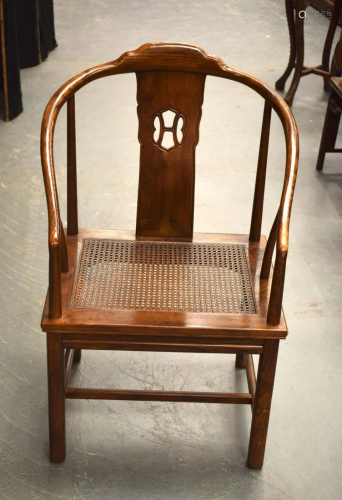 AN EARLY 20TH CENTURY CHINESE CARVED HARDWOOD ARMCHAIR. 90 c...