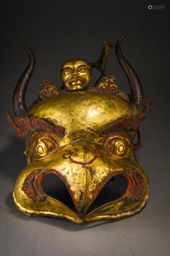 A Chinese Bronze-gilt Garuda Head