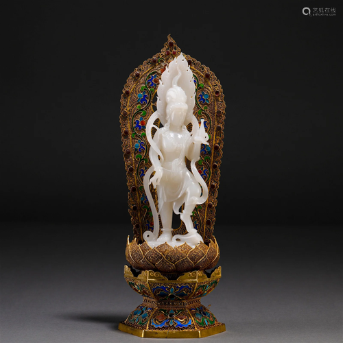 A Chinese Carved White Jade Figure of Guanyin