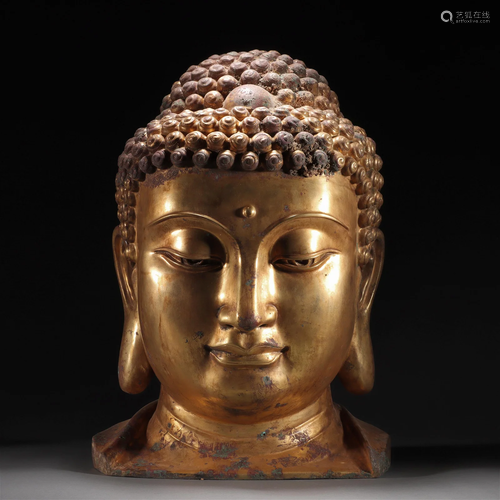 A Chinese Bronze-gilt Buddha Head