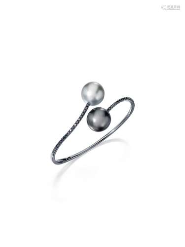 A CULTURED PEARL AND DIAMOND BANGLE