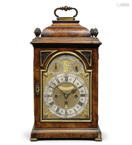 A brass-mounted walnut table clock of excellent colour, mid ...