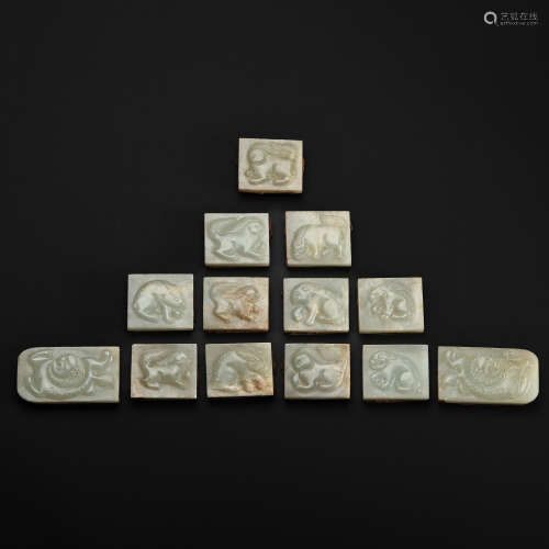 A SET OF CHINESE LIAO DYNASTY HETIAN JADE BELT PLATES