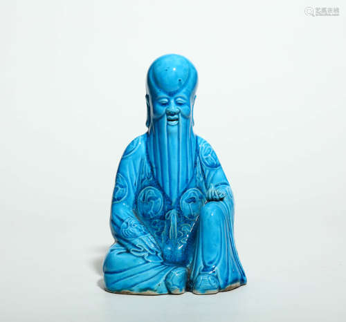 清乾隆 孔雀蓝釉雕瓷寿星坐像