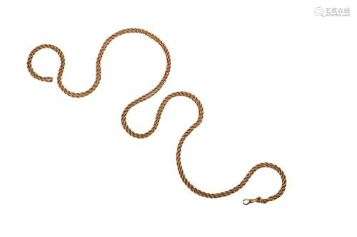 Un long collier en chaîne torsadée en corde dorée, longueur ...