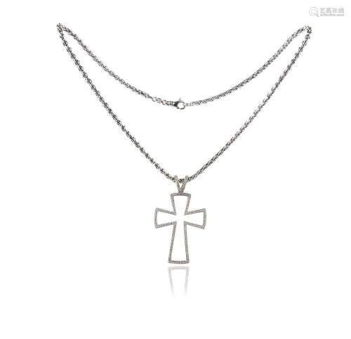 Un pendentif en forme de croix en diamant de Theo Fennell, s...