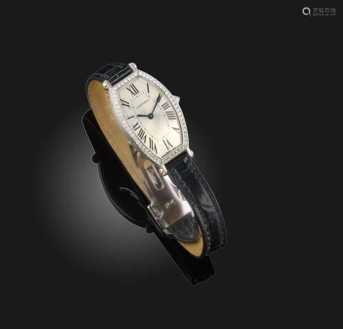 Une montre-bracelet de dame en diamant, 'Tonneau', Cartier, ...