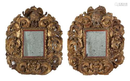 Pair of baroque mirrors of the XIX century. Carved and gilde...