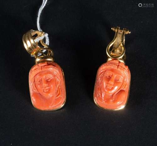 PAIR OF EARRINGS WITH AN IMPORTANT PAIR OF CAMEOS IN RED COR...