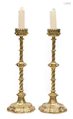 A Pair of Victorian Brass Candlestands, in gothic style,with...