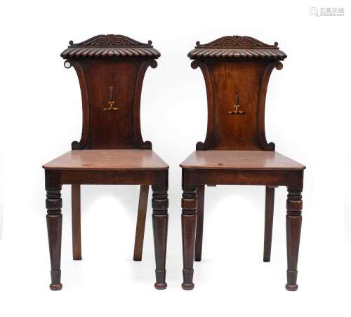 A Pair of William IV Mahogany Hall Chairs, with foliate and ...