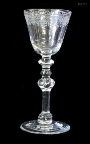 A Newcastle Wine Glass, circa 1740, the rounded funnel bowl ...