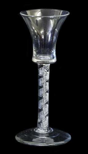 A Balustroid Wine Glass, circa 1740, the bell shaped bowl on...