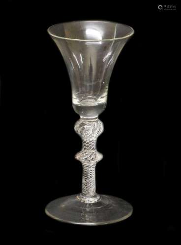 A Large Wine Glass, circa 1745, the bell-shaped bowl on an a...
