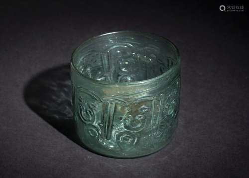 A FATIMID CARVED TURQUOISE GLASS BOWL, EGYPT 9TH CENTURY