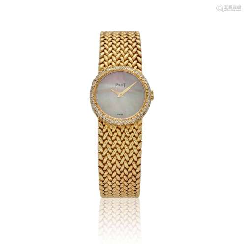 PIAGET. AN 18K GOLD LADY'S MANUAL WIND BRACELET WATCH Protoc...