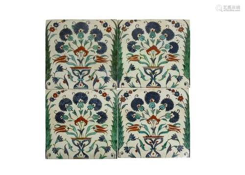 A SET OF FOUR FLORAL IZNIK TILES, OTTOMAN EARLY 17TH CENTURY