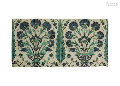 A SET OF TWO FLORAL IZNIK TILES, OTTOMAN EARLY 17TH CENTURY