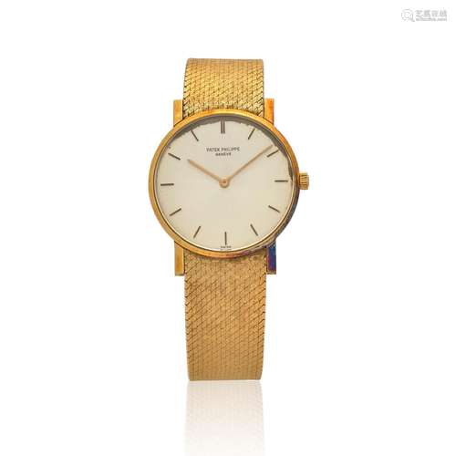 PATEK PHILIPPE. AN 18K GOLD MANUAL WIND BRACELET WATCH Calat...