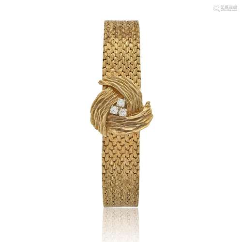 【¤】BAUME & MERCIER. A 14K GOLD LADY'S MANUAL WIND BRACEL...