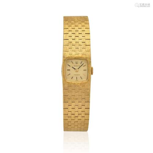 ROLEX. A LADY'S 18K GOLD MANUAL WIND BRACELET WATCHRef 2638,...