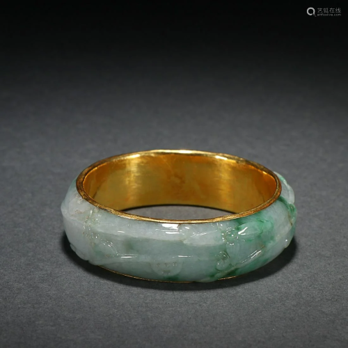 CHINESE GOLD-MOUNTED JADEITE BANGLE WITH CARVED 'BAT AN...