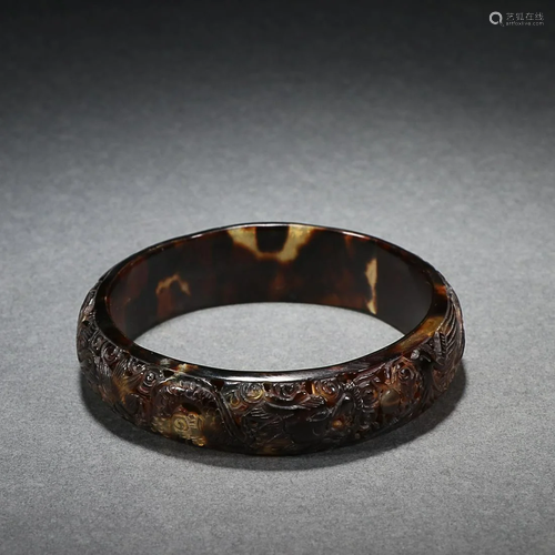 CHINESE TORTOISESHELL BANGLE WITH CARVED 'DRAGON AND PH...