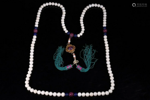 CHINESE PEARL ROSARY WITH CARVED 'SHOU MEDALLION'