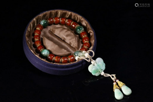 CHINESE RARE MATERIAL ROSARY WITH JADEITE DROPLET