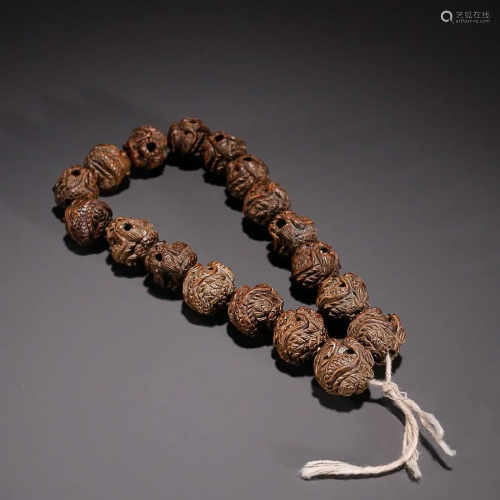 CHINESE AGARWOOD ROSARY WITH CARVED 'DRAGON'
